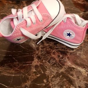 Pink and white Converses